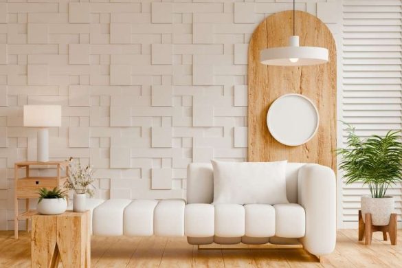 Une banquette capitonnée blanche, exemple de mobilier modulable, est placée devant un mur texturé dans un intérieur d'inspiration Japandi.